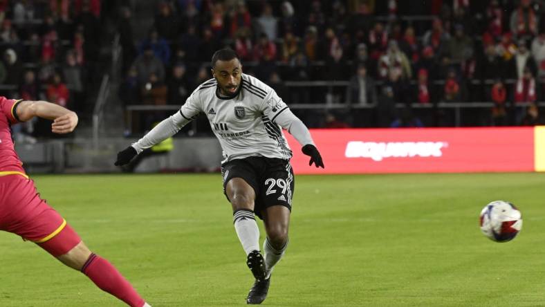 Mar 18, 2023; St. Louis, Missouri, USA; San Jose Earthquakes defender Carlos Akapo (29) shoots the ball against the St. Louis City SC during the first half at CITYPARK. Mandatory Credit: Jeff Le-USA TODAY Sports