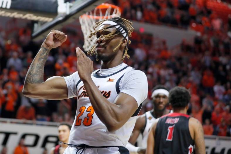 Oklahoma State Cowboys forward Tyreek Smith (23) celebrates after drawing a foul and making a basket during a college basketball game between the Oklahoma State Cowboys (OSU) and the Eastern Washington Eagles in the second round of the NIT at Gallagher-Iba Arena in Stillwater, Okla., Sunday, March 19, 2023.

Osu Nit
