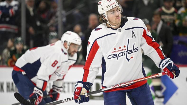 Mar 19, 2023; Saint Paul, Minnesota, USA; Washington Capitals forward T.J. Oshie (77) heads to the face-off circle against the Minnesota Wild during the third period at Xcel Energy Center. Mandatory Credit: Nick Wosika-USA TODAY Sports