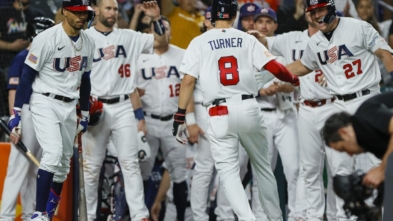 Mar 19, 2023; Miami, Florida, USA; USA shortstop Trea Turner (8) celebrates with teammates after hitting a home run during the second inning against Cuba at LoanDepot Park. Mandatory Credit: Sam Navarro-USA TODAY Sports