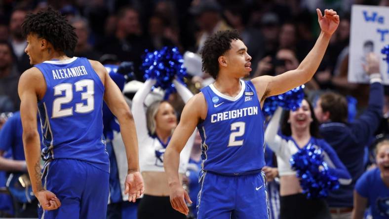 Mar 19, 2023; Denver, CO, USA; Creighton Bluejays guard Ryan Nembhard (2) and guard Trey Alexander (23) celebrate in the second half against the Baylor Bears at Ball Arena. Mandatory Credit: Michael Ciaglo-USA TODAY Sports