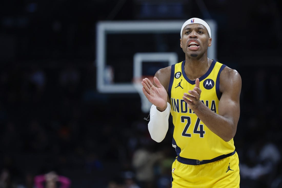 Mar 20, 2023; Charlotte, North Carolina, USA; Indiana Pacers guard Buddy Hield (24) encourages his team as they play against the Charlotte Hornets during the second half at Spectrum Center. Mandatory Credit: Nell Redmond-USA TODAY Sports