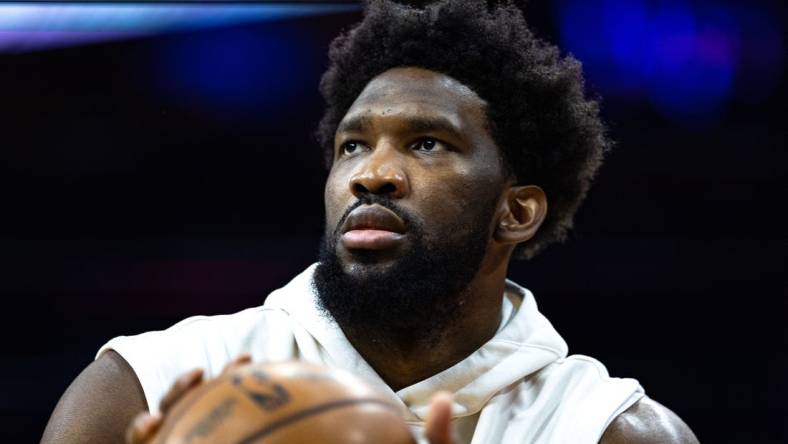 Mar 20, 2023; Philadelphia, Pennsylvania, USA; Philadelphia 76ers center Joel Embiid (21) warms up before a game against the Chicago Bulls at Wells Fargo Center. Mandatory Credit: Bill Streicher-USA TODAY Sports