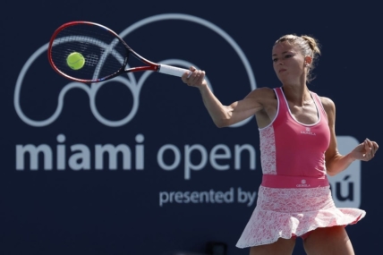 Mar 21, 2023; Miami, Florida, US; Camila Giorgi (ITA) hits a forehand against Kaia Kanepi (EST) (not pictured) during a on day two of the Miami Open at Hard Rock Stadium. Mandatory Credit: Geoff Burke-USA TODAY Sports