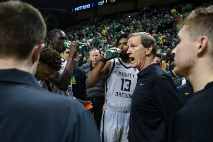 Oregon head coach Dana Altman talks to his players as the Oregon Ducks host Wisconsin in the quarterfinal round of the NIT Tuesday, March 21, 2023 at Matthew Knight Arena in Eugene, Ore.

Ncaa Basketball Wisconsin At Oregon Mbb Nit Wisconsin At Oregon