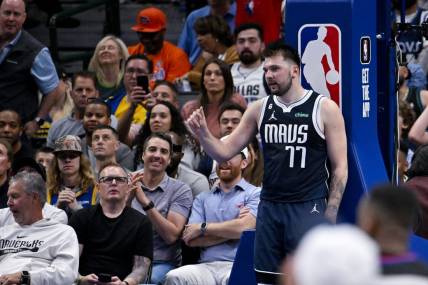 Mar 22, 2023; Dallas, Texas, USA; Dallas Mavericks guard Luka Doncic (77) gestures with his hand to the referees after a foul call during the second half against the Golden State Warriors at the American Airlines Center. Mandatory Credit: Jerome Miron-USA TODAY Sports
