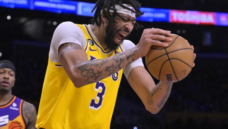 Mar 22, 2023; Los Angeles, California, USA;   Los Angeles Lakers forward Anthony Davis (3) reacts after he was called for a foul in the second half against the Phoenix Suns at Crypto.com Arena. Mandatory Credit: Jayne Kamin-Oncea-USA TODAY Sports