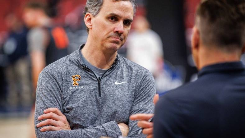 Mar 23, 2023; Louisville, KY, USA; Princeton Tigers head coach Mitch Henderson has a discussion during practice for the NCAA Tournament South Regional game at KFC YUM! Center. Mandatory Credit: Jordan Prather-USA TODAY Sports