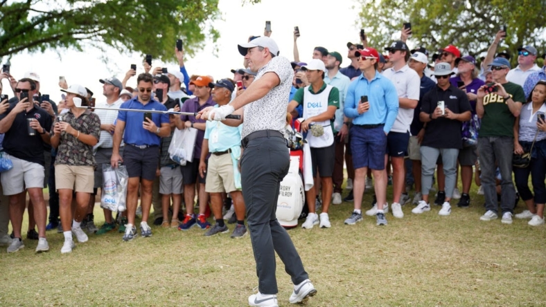 Mar 23, 2023; Austin, Texas, USA; Rory McIlroy chips from outside the ropes during the second round of the World Golf Championships-Dell Technologies Match Play golf tournament. Mandatory Credit: Dustin Safranek-USA TODAY Sports