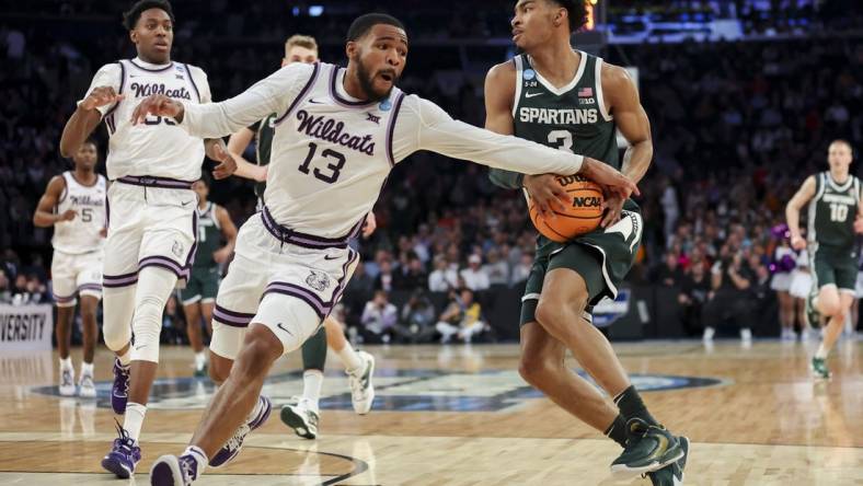 Mar 23, 2023; New York, NY, USA;  Kansas State Wildcats guard Desi Sills (13) reaches for the ball against Michigan State Spartans guard Jaden Akins (3) in the second half at Madison Square Garden. Mandatory Credit: Brad Penner-USA TODAY Sports