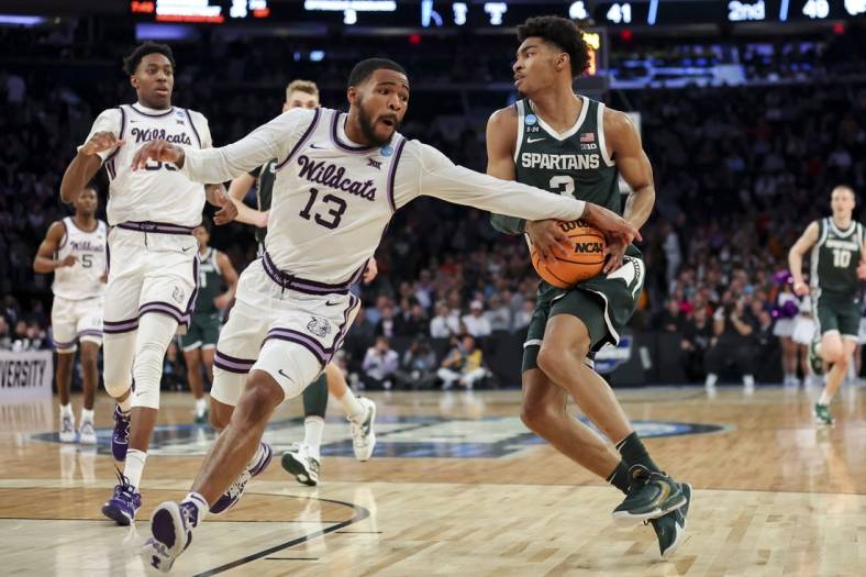 Mar 23, 2023; New York, NY, USA;  Kansas State Wildcats guard Desi Sills (13) reaches for the ball against Michigan State Spartans guard Jaden Akins (3) in the second half at Madison Square Garden. Mandatory Credit: Brad Penner-USA TODAY Sports