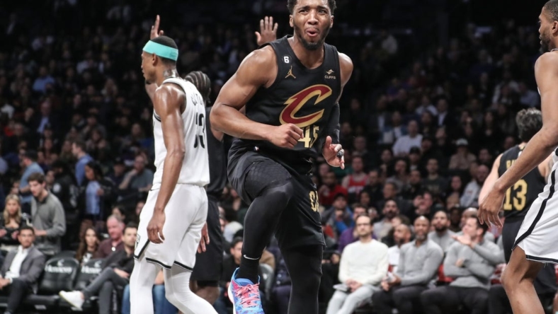 Mar 23, 2023; Brooklyn, New York, USA;  Cleveland Cavaliers guard Donovan Mitchell (45) reacts after being called for a foul in the third quarter against the Brooklyn Nets at Barclays Center. Mandatory Credit: Wendell Cruz-USA TODAY Sports