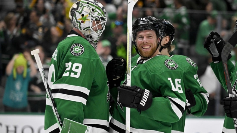 Mar 23, 2023; Dallas, Texas, USA; Dallas Stars goaltender Jake Oettinger (29) and center Joe Pavelski (16) celebrate the victory over the Pittsburgh Penguins at the American Airlines Center. Mandatory Credit: Jerome Miron-USA TODAY Sports