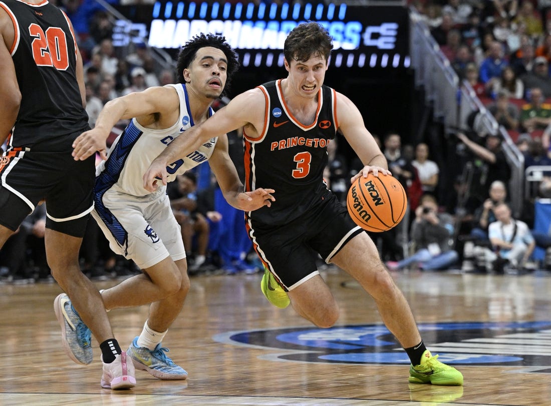 Mar 24, 2023; Louisville, KY, USA; Princeton Tigers guard Ryan Langborg (3) dribbles against Creighton Bluejays guard Ryan Nembhard (2) during the second half of the NCAA tournament round of sixteen at KFC YUM! Center. Mandatory Credit: Jamie Rhodes-USA TODAY Sports