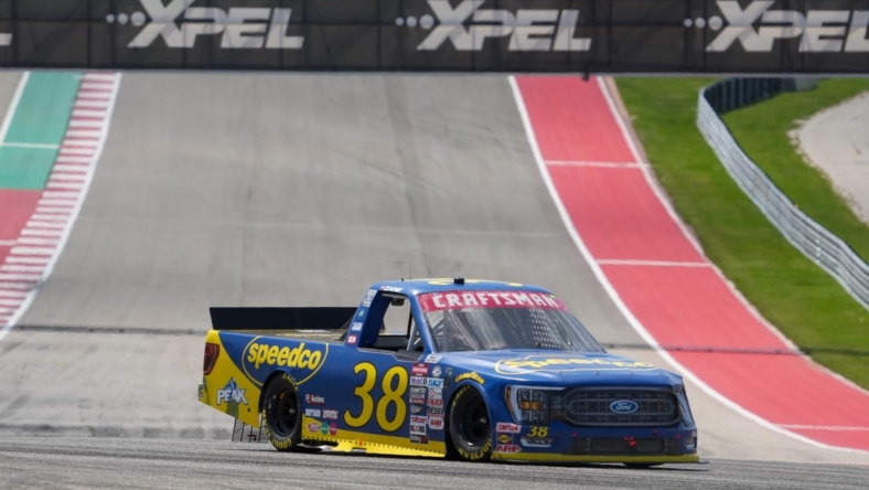 Mar 25, 2023; Austin, Texas, USA;  NASCAR Craftsman Truck Series driver Zane Smith (38) goes into turn eleven at Circuit of the Americas. Mandatory Credit: Daniel Dunn-USA TODAY Sports