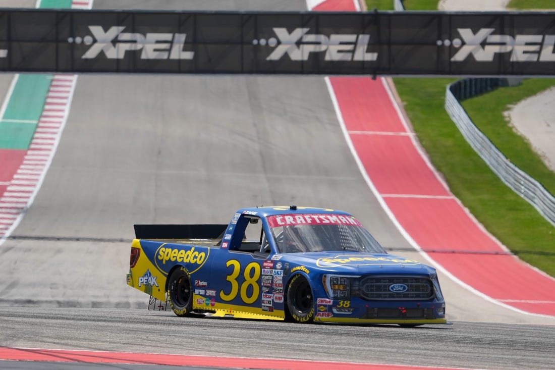 Mar 25, 2023; Austin, Texas, USA;  NASCAR Craftsman Truck Series driver Zane Smith (38) goes into turn eleven at Circuit of the Americas. Mandatory Credit: Daniel Dunn-USA TODAY Sports