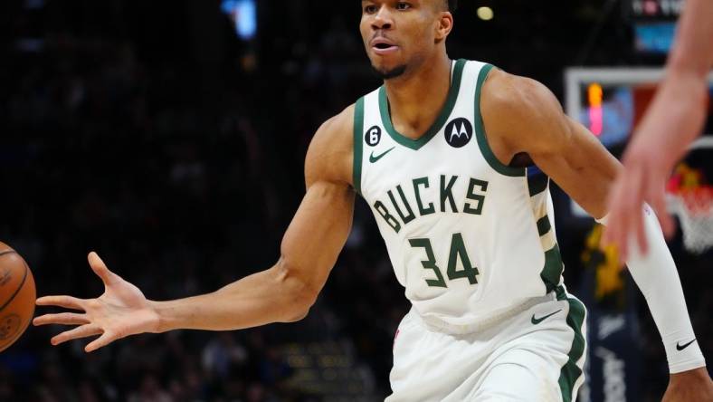 Mar 25, 2023; Denver, Colorado, USA; Milwaukee Bucks forward Giannis Antetokounmpo (34) passes the ball in the second quarter against the Denver Nuggets at Ball Arena. Mandatory Credit: Ron Chenoy-USA TODAY Sports