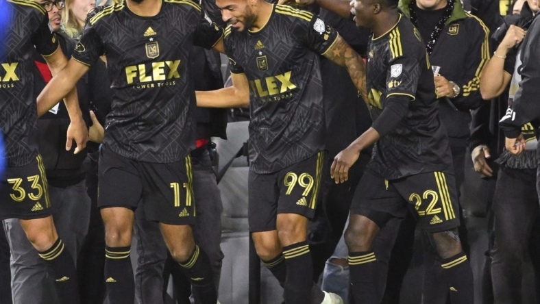 Mar 25, 2023; Los Angeles, California, USA; Los Angeles FC celebrates after a goal by forward Denis Bouanga (99) in the second half against the FC Dallas at BMO Stadium. Mandatory Credit: Jayne Kamin-Oncea-USA TODAY Sports