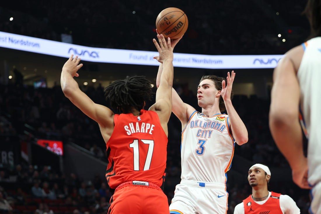 Mar 26, 2023; Portland, Oregon, USA;  Oklahoma City Thunder guard Josh Giddey (3) shoots the ball over Portland Trail Blazers guard Shaedon Sharpe (17) in the first half at Moda Center. Mandatory Credit: Jaime Valdez-USA TODAY Sports