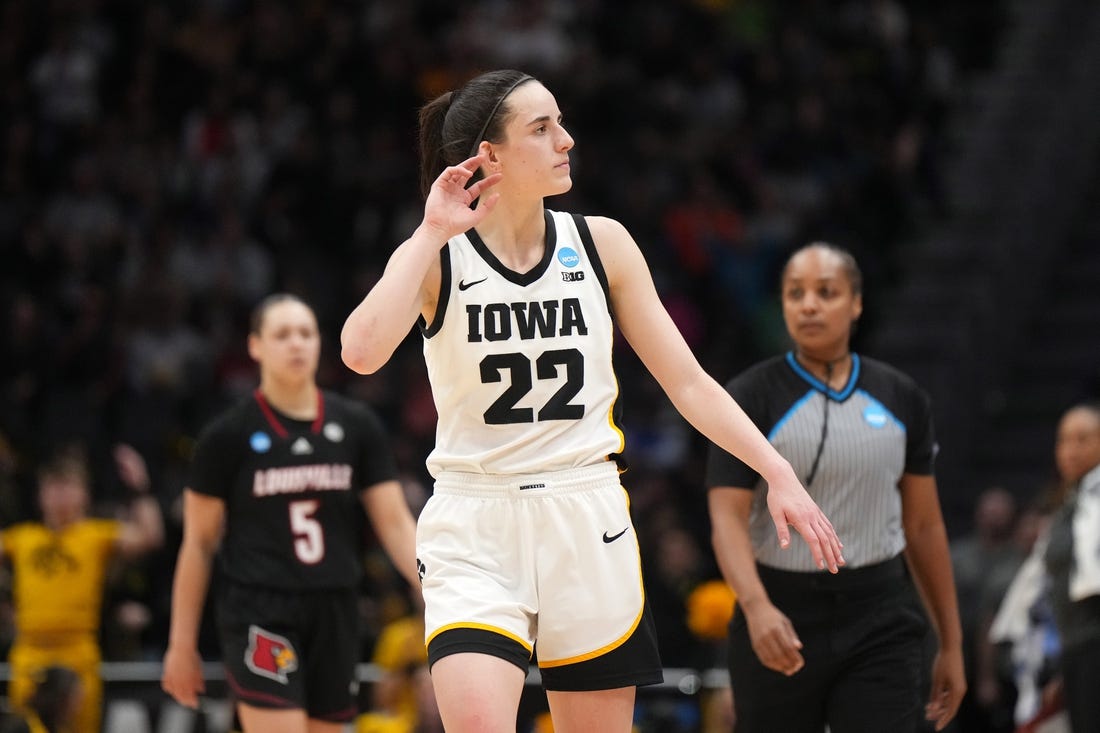 Mar 26, 2023; Seattle, WA, USA; Iowa Hawkeyes guard Caitlin Clark (22) reacts against the Louisville Cardinals in the second half at Climate Pledge Arena. Mandatory Credit: Kirby Lee-USA TODAY Sports