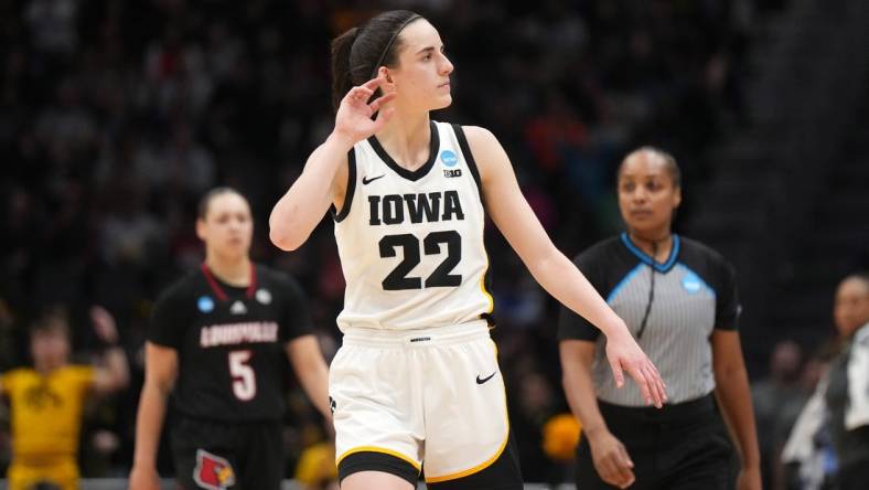 Mar 26, 2023; Seattle, WA, USA; Iowa Hawkeyes guard Caitlin Clark (22) reacts against the Louisville Cardinals in the second half at Climate Pledge Arena. Mandatory Credit: Kirby Lee-USA TODAY Sports