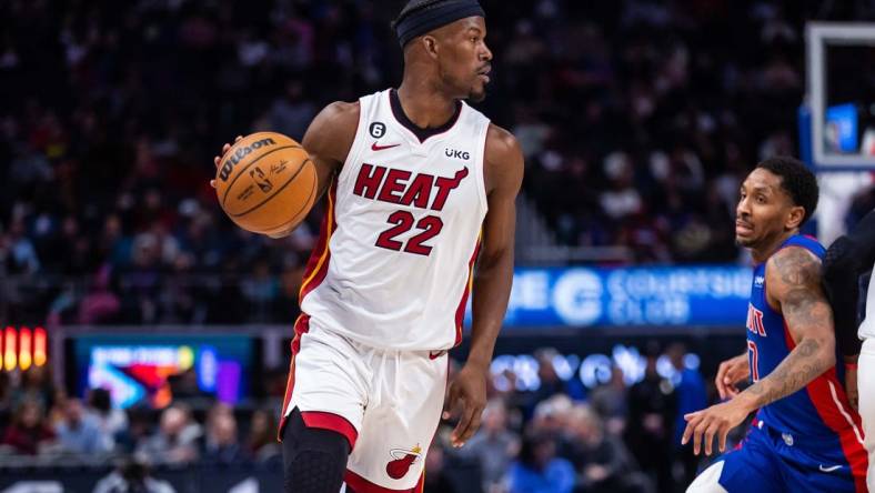 Mar 19, 2023; Detroit, Michigan, USA; Miami Heat forward Jimmy Butler (22) handles the ball in the second quarter against the Detroit Pistons at Little Caesars Arena. Mandatory Credit: Allison Farrand-USA TODAY Sports