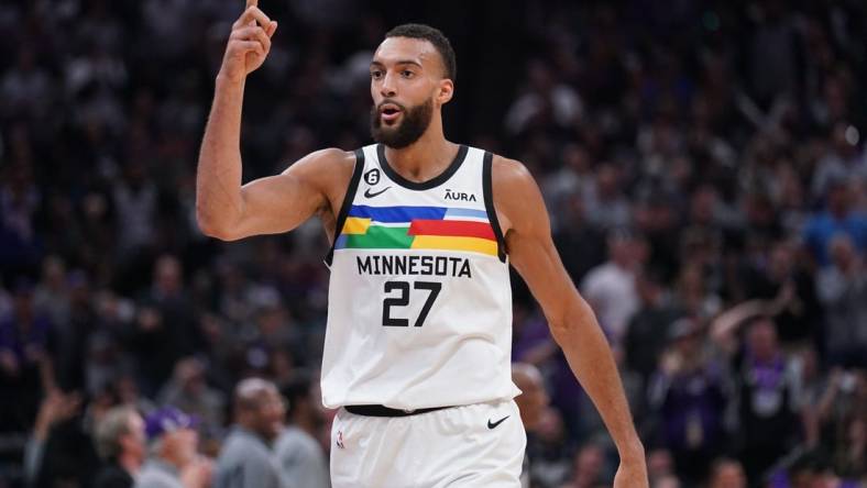 Mar 27, 2023; Sacramento, California, USA; Minnesota Timberwolves center Rudy Gobert (27) reacts after being called for a foul against the Sacramento Kings in the second quarter at the Golden 1 Center. Mandatory Credit: Cary Edmondson-USA TODAY Sports