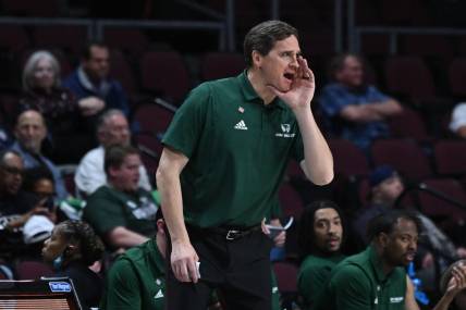 Mar 28, 2023; Las Vegas, Nevada, USA; Utah Valley Wolverines head coach Mark Madsen calls to his team in the second half against the UAB Blazers at Orleans Arena. Mandatory Credit: Candice Ward-USA TODAY Sports