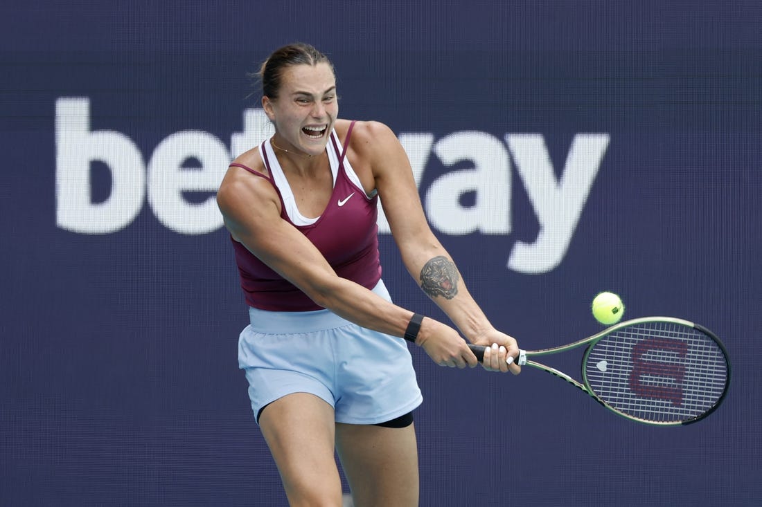 Mar 29, 2023; Miami, Florida, US; Aryna Sabalenka hits a backhand against Sorana Cirstea (ROU) (not pictured) in a women's singles quarterfinal on day ten of the Miami Open at Hard Rock Stadium. Mandatory Credit: Geoff Burke-USA TODAY Sports