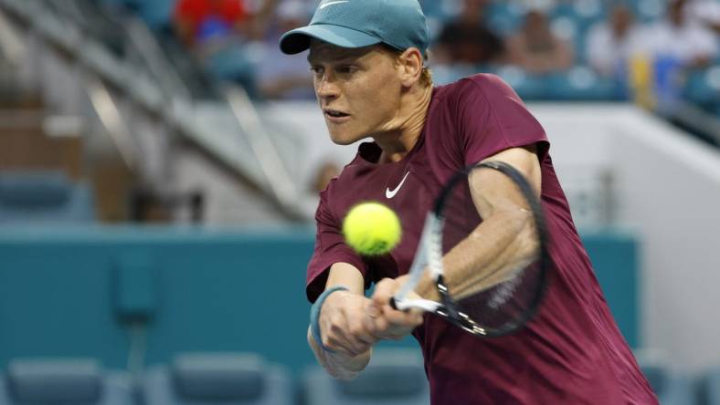 Mar 29, 2023; Miami, Florida, US; Jannik Sinner (ITA) hits a backhand against Emil Ruusuvuori (FIN) (not pictured) in a men's singles quarterfinal on day ten of the Miami Open at Hard Rock Stadium. Mandatory Credit: Geoff Burke-USA TODAY Sports