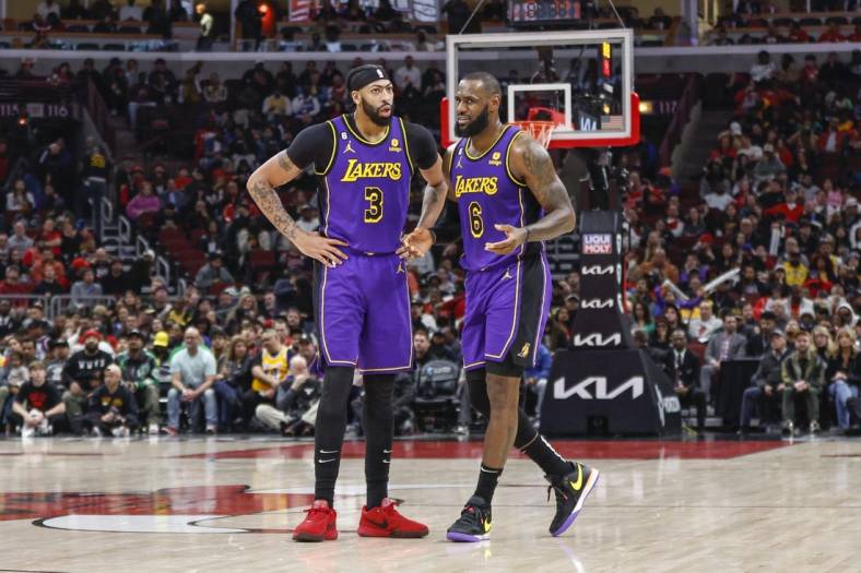 Mar 29, 2023; Chicago, Illinois, USA; Los Angeles Lakers forward LeBron James (6) chats with Los Angeles Lakers forward Anthony Davis (3) during the second half of an NBA game against the Chicago Bulls at United Center. Mandatory Credit: Kamil Krzaczynski-USA TODAY Sports