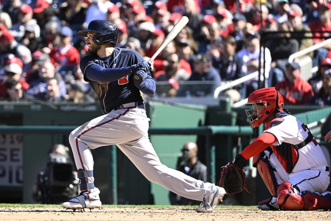 Mar 30, 2023; Washington, District of Columbia, USA; Atlanta Braves catcher Travis d'Arnaud (16) singles against the Washington Nationals during the sixth inning at Nationals Park. Mandatory Credit: Brad Mills-USA TODAY Sports