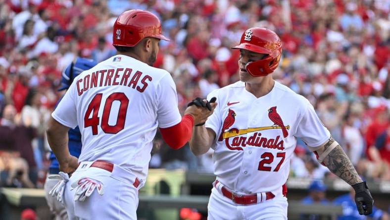 Mar 30, 2023; St. Louis, Missouri, USA;  St. Louis Cardinals center fielder Tyler O'Neill (27) celebrates with catcher Willson Contreras (40) after hitting a two run home run against the Toronto Blue Jays during the third inning at Busch Stadium. Mandatory Credit: Jeff Curry-USA TODAY Sports