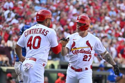 Mar 30, 2023; St. Louis, Missouri, USA;  St. Louis Cardinals center fielder Tyler O'Neill (27) celebrates with catcher Willson Contreras (40) after hitting a two run home run against the Toronto Blue Jays during the third inning at Busch Stadium. Mandatory Credit: Jeff Curry-USA TODAY Sports
