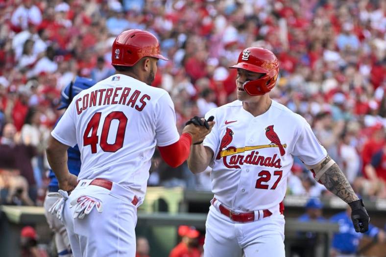 Mar 30, 2023; St. Louis, Missouri, USA;  St. Louis Cardinals center fielder Tyler O'Neill (27) celebrates with catcher Willson Contreras (40) after hitting a two run home run against the Toronto Blue Jays during the third inning at Busch Stadium. Mandatory Credit: Jeff Curry-USA TODAY Sports