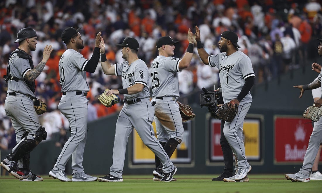 Mar 30, 2023; Houston, Texas, USA; Chicago White Sox first baseman Andrew Vaughn (25) celebrates with teammates after the White Sox defeated the Houston Astros at Minute Maid Park. Mandatory Credit: Troy Taormina-USA TODAY Sports