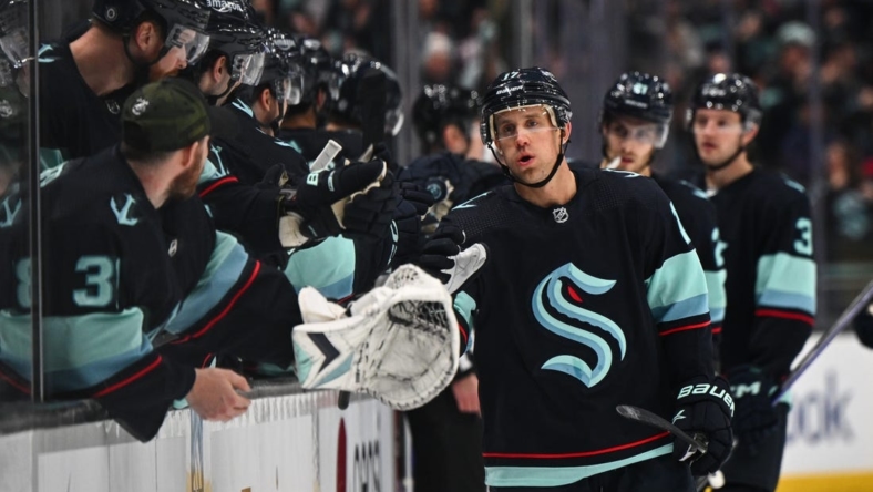 Mar 30, 2023; Seattle, Washington, USA; Seattle Kraken center Jaden Schwartz (17) celebrates with the bench after scoring a goal against the Anaheim Ducks during the first period at Climate Pledge Arena. Mandatory Credit: Steven Bisig-USA TODAY Sports