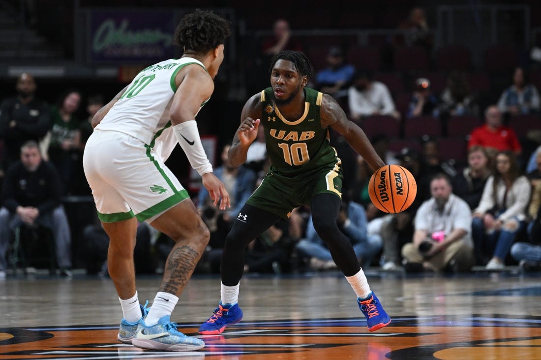 Mar 30, 2023; Las Vegas, NV, USA; North Texas Mean Green guard Kai Huntsberry (10) defends UAB Blazers guard Jordan Walker (10) in the first half at Orleans Arena. Mandatory Credit: Candice Ward-USA TODAY Sports