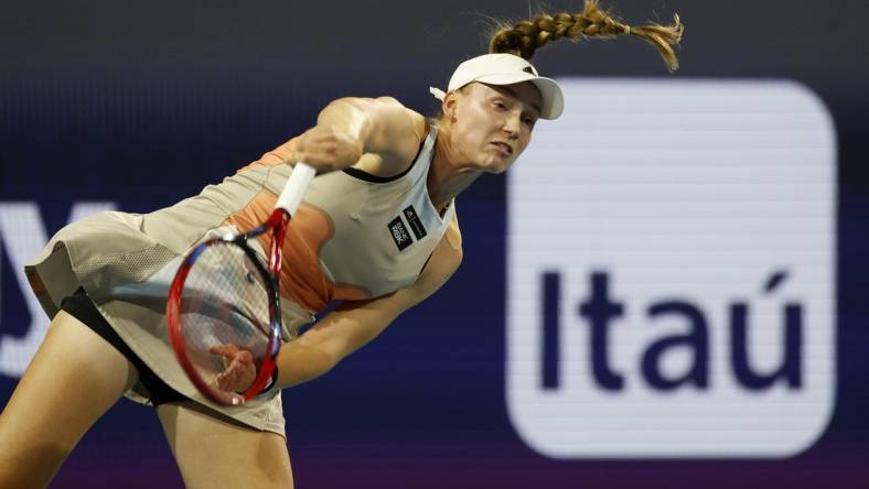 Mar 30, 2023; Miami, Florida, US; Elena Rybakina (KAZ) serves against Jessica Pegula (USA) (not pictured) in a women's singles semifinal on day eleven of the Miami Open at Hard Rock Stadium. Mandatory Credit: Geoff Burke-USA TODAY Sports