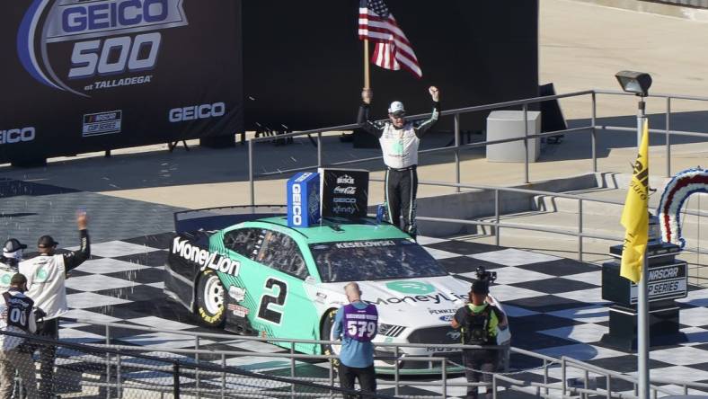 Apr 25, 2021; Talladega, Alabama, USA; NASCAR Cup Series driver Brad Keselowski (2) celebrates after winning the GEICO 500 at Talladega Superspeedway. Mandatory Credit: Marvin Gentry-USA TODAY Sports