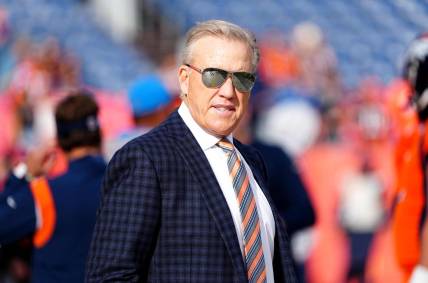 Nov 28, 2021; Denver, Colorado, USA; Denver Broncos president of football operations John Elway before the game against the Los Angeles Chargers at Empower Field at Mile High. Mandatory Credit: Ron Chenoy-USA TODAY Sports