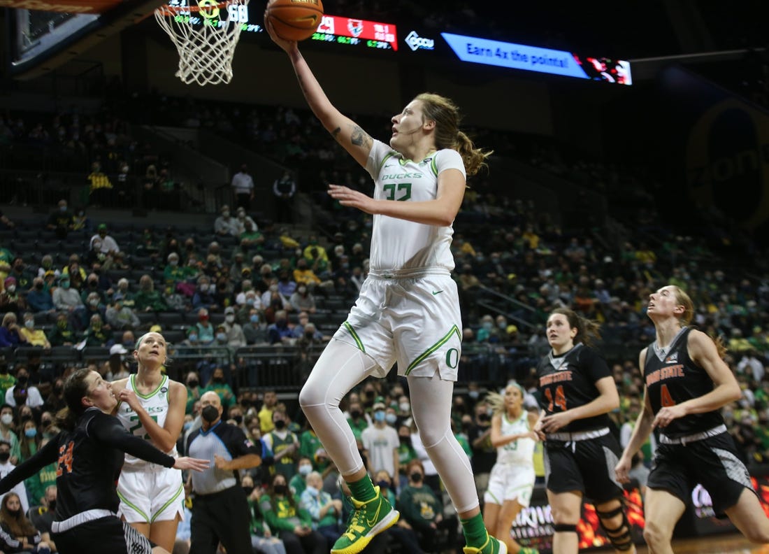 Oregon's Sedona Prince, center, goes up for a shot during the second half against  Idaho State.

Eug 031522 Prince 03