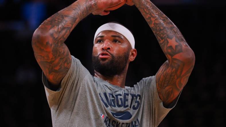 Apr 18, 2022; San Francisco, California, USA; Denver Nuggets center DeMarcus Cousins (4) warms up before game two of the first round for the 2022 NBA playoffs at Chase Center against the Golden State Warriors. Mandatory Credit: Kelley L Cox-USA TODAY Sports