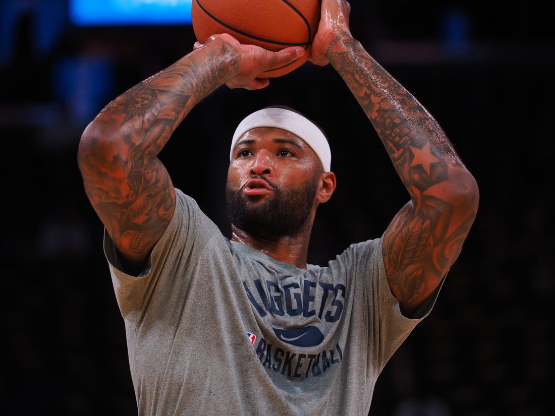 Apr 18, 2022; San Francisco, California, USA; Denver Nuggets center DeMarcus Cousins (4) warms up before game two of the first round for the 2022 NBA playoffs at Chase Center against the Golden State Warriors. Mandatory Credit: Kelley L Cox-USA TODAY Sports