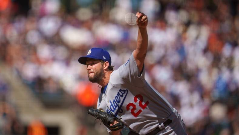 Jun 11, 2022; San Francisco, California, USA;  Los Angeles Dodgers starting pitcher Clayton Kershaw (22) delivers a pitch during the first inning against the San Francisco Giants at Oracle Park. Mandatory Credit: Neville E. Guard-USA TODAY Sports