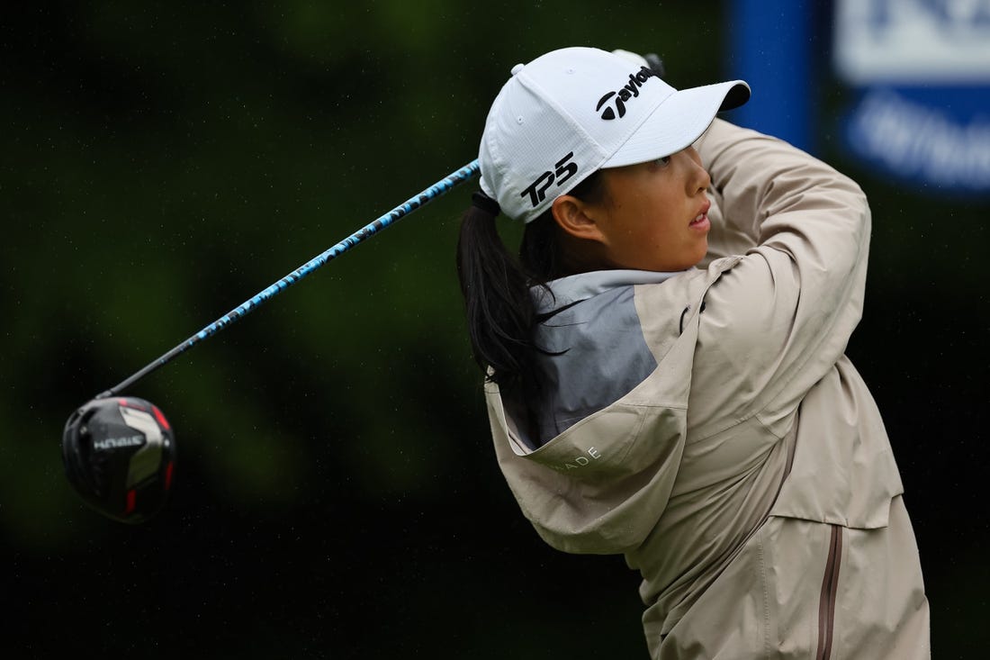 Jun 23, 2022; Bethesda, Maryland, USA; Ruoning Yin plays her shot from the 11th tee during the first round of the KPMG Women's PGA Championship golf tournament at Congressional Country Club. Mandatory Credit: Scott Taetsch-USA TODAY Sports