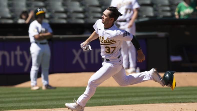 Aug 10, 2022; Oakland, California, USA; Oakland Athletics center fielder Cal Stevenson (37) scores on a three-RBI double by Tony Kemp (not pictured) during the seventh inning against the Los Angeles Angels at RingCentral Coliseum. Mandatory Credit: D. Ross Cameron-USA TODAY Sports