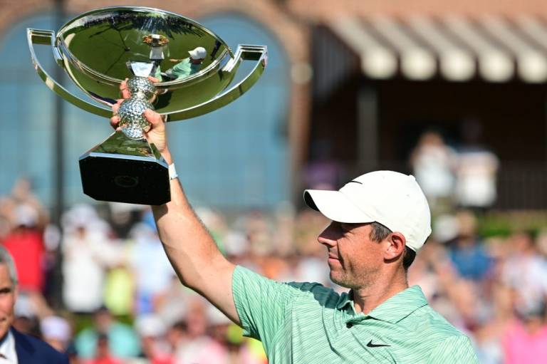 Aug 28, 2022; Atlanta, Georgia, USA; Rory McIlroy holds up the FedEx Cup trophy after winning the TOUR Championship golf tournament. Mandatory Credit: Adam Hagy-USA TODAY Sports