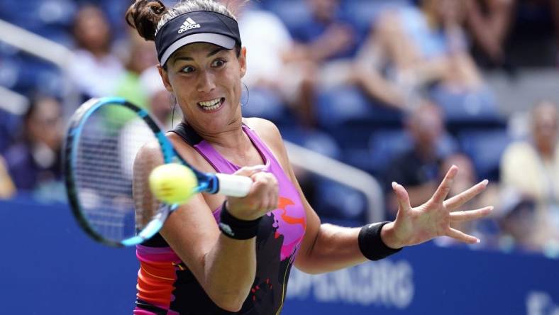 Sep 3, 2022; Flushing, NY, USA; Garbine Muguruza of Spain hits to Petra Kvitova of Czech Republic on day six of the 2022 U.S. Open tennis tournament at USTA Billie Jean King Tennis Center. Mandatory Credit: Danielle Parhizkaran-USA TODAY Sports