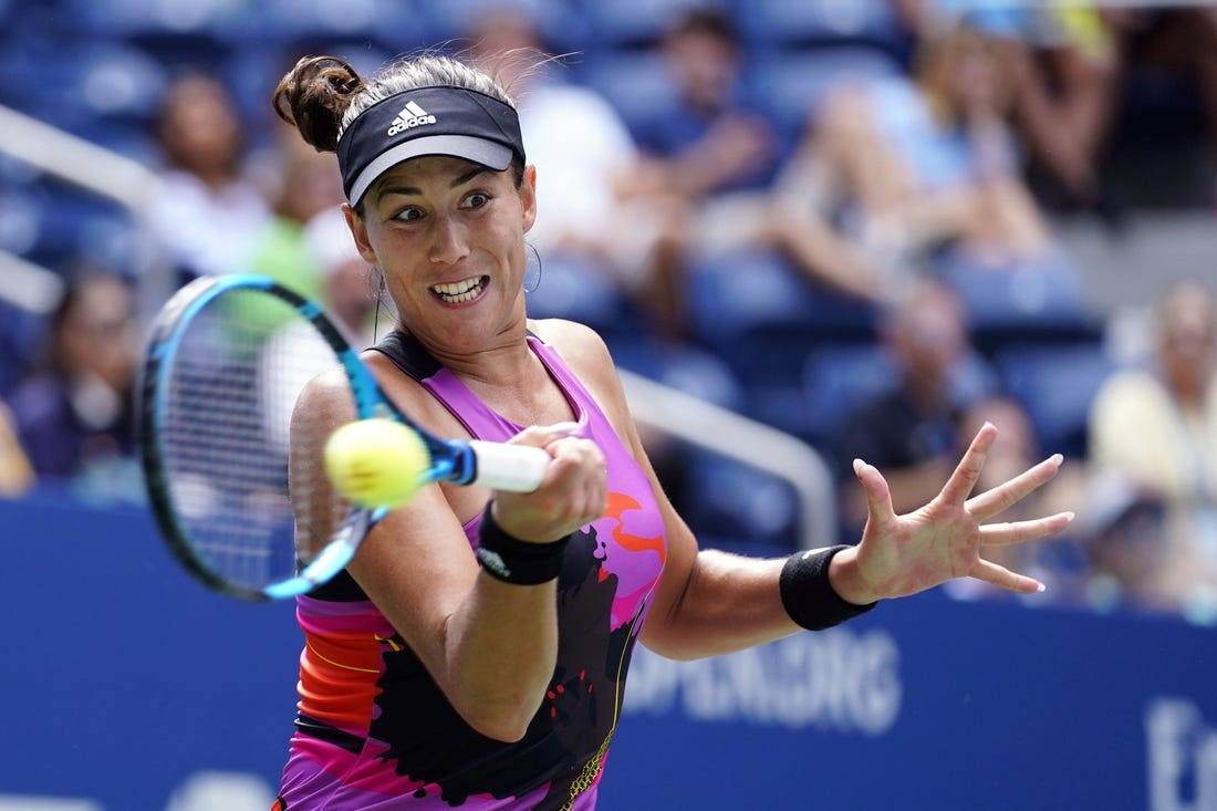 Sep 3, 2022; Flushing, NY, USA; Garbine Muguruza of Spain hits to Petra Kvitova of Czech Republic on day six of the 2022 U.S. Open tennis tournament at USTA Billie Jean King Tennis Center. Mandatory Credit: Danielle Parhizkaran-USA TODAY Sports